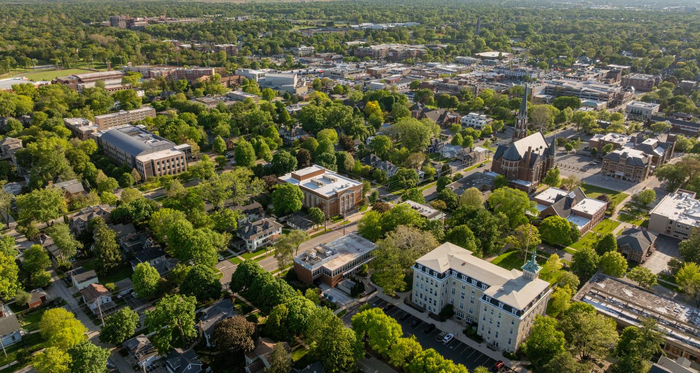 A drone still of campus on a sunny day.