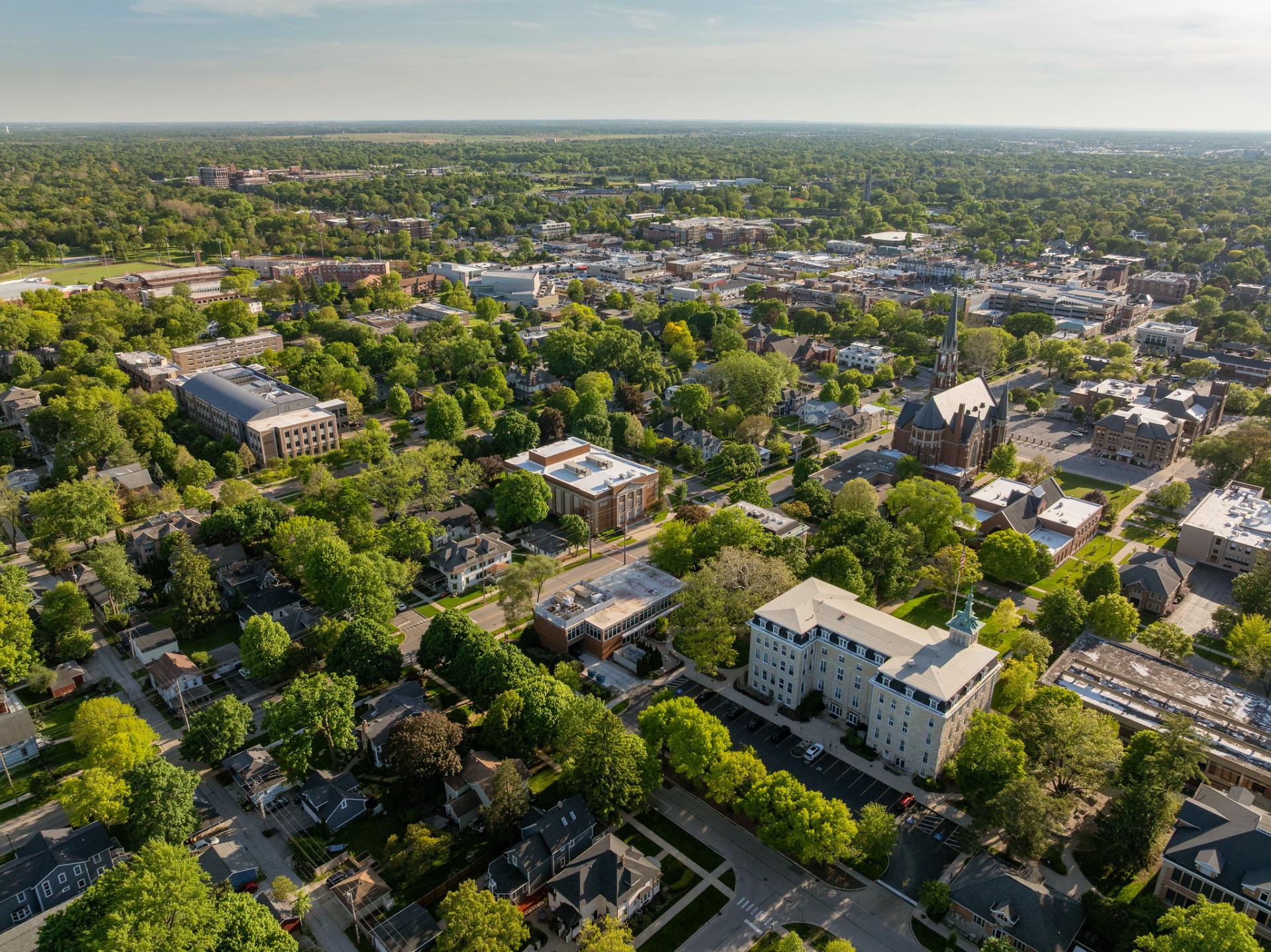 A drone still of campus on a sunny day.