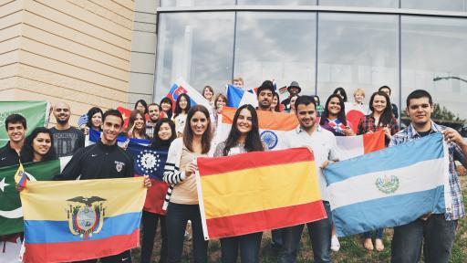 International students holding flags