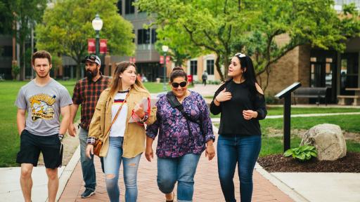 group of students walking on campus