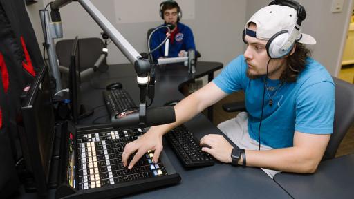 Student working with radio equipment