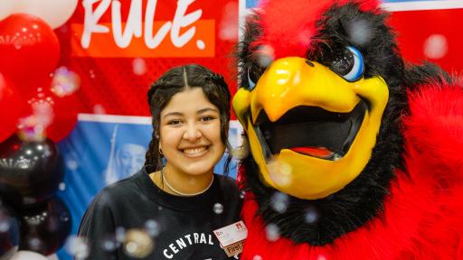 Student posing with Chippy